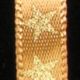 Woven Edge Printed Satin Star 1/4 Inch 100 Yards Gold/copper