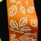 Wired Taffeta Print Leaves 1.5 in 27 yd Orange